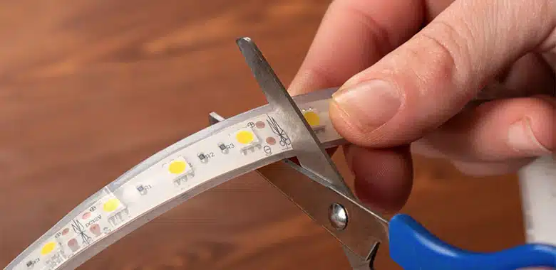 someone cutting led strip